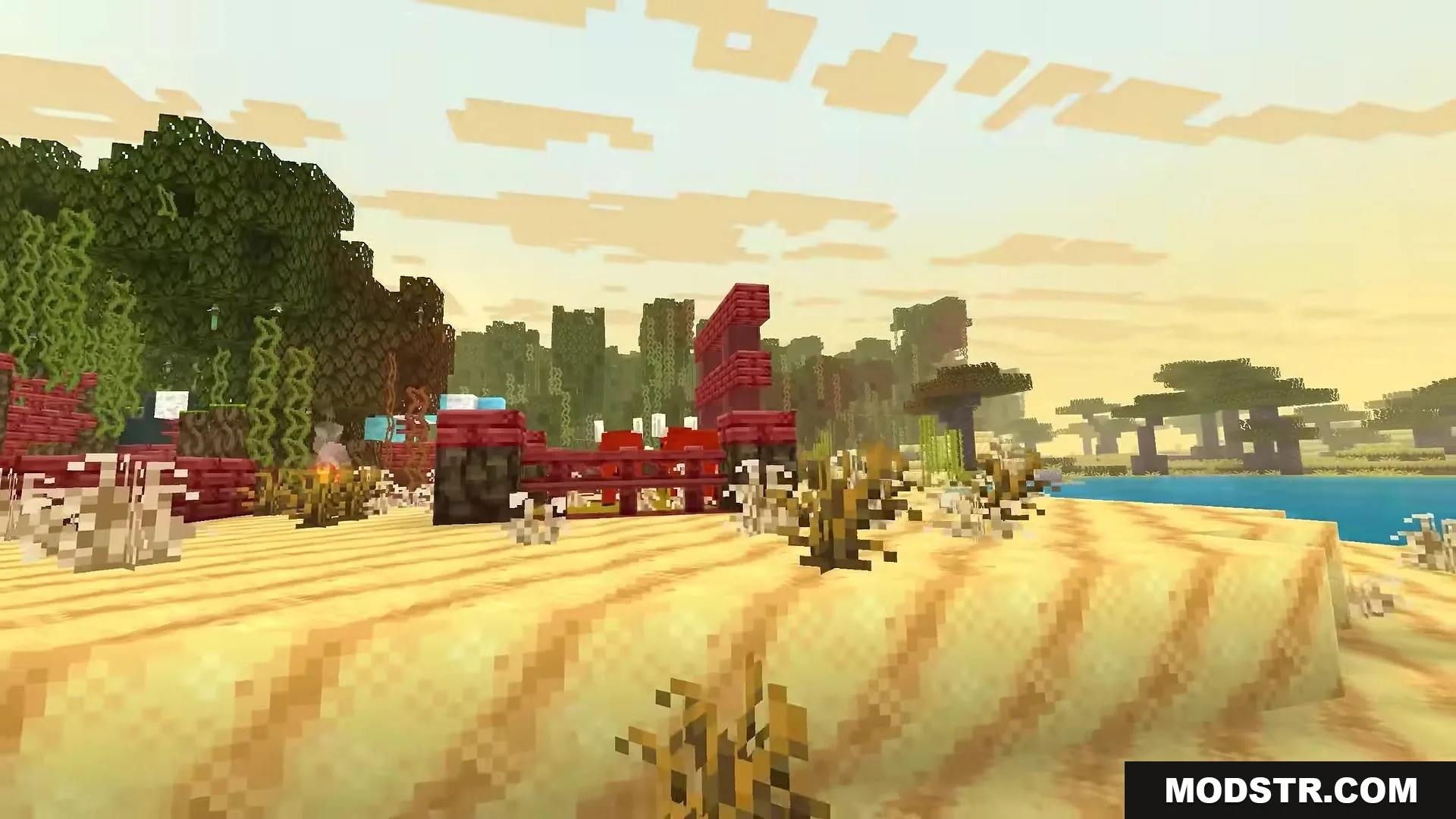 Stupendous Visuals Resource Pack Screenshot 16 Red wooden fences and dry bushes sit on a sandy beach at sunset