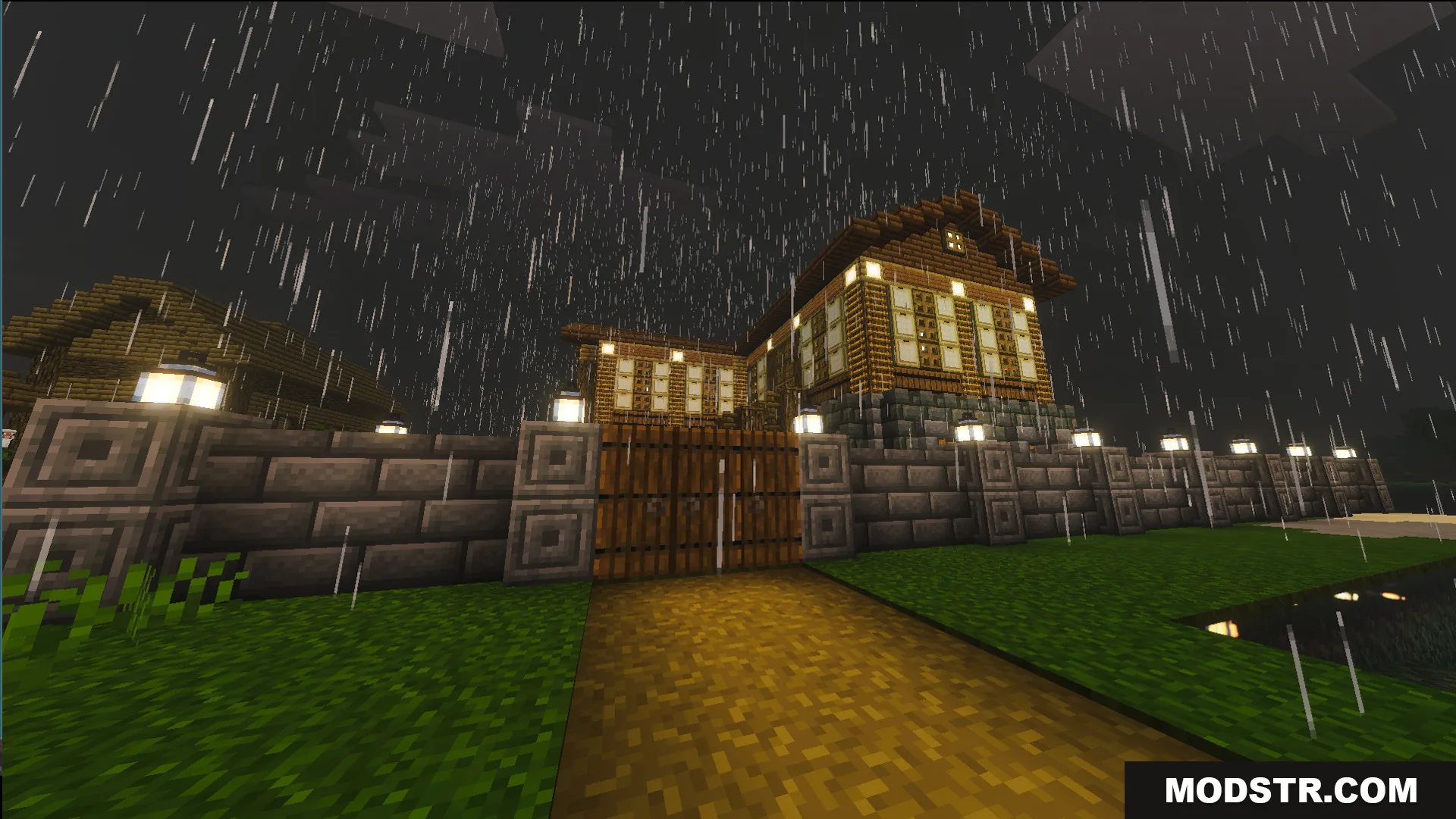 A stone brick wall and wooden gate surround the traditional house in rain