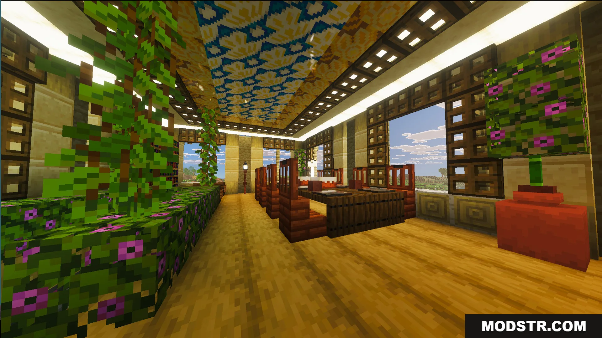 Inside the Survival Filo House 28 mansion featuring patterned ceilings and lush plants