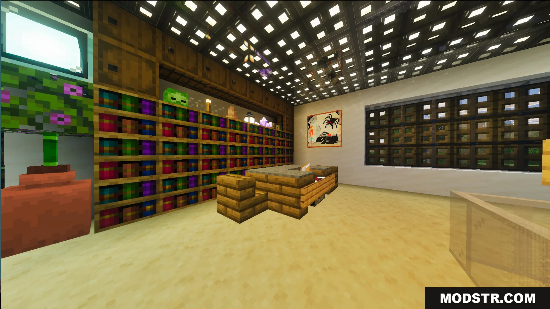 Survival Modern House 44 Map Screenshot 9 Modern interior room with colorful bookshelves a large screen and glowing ceiling blocks