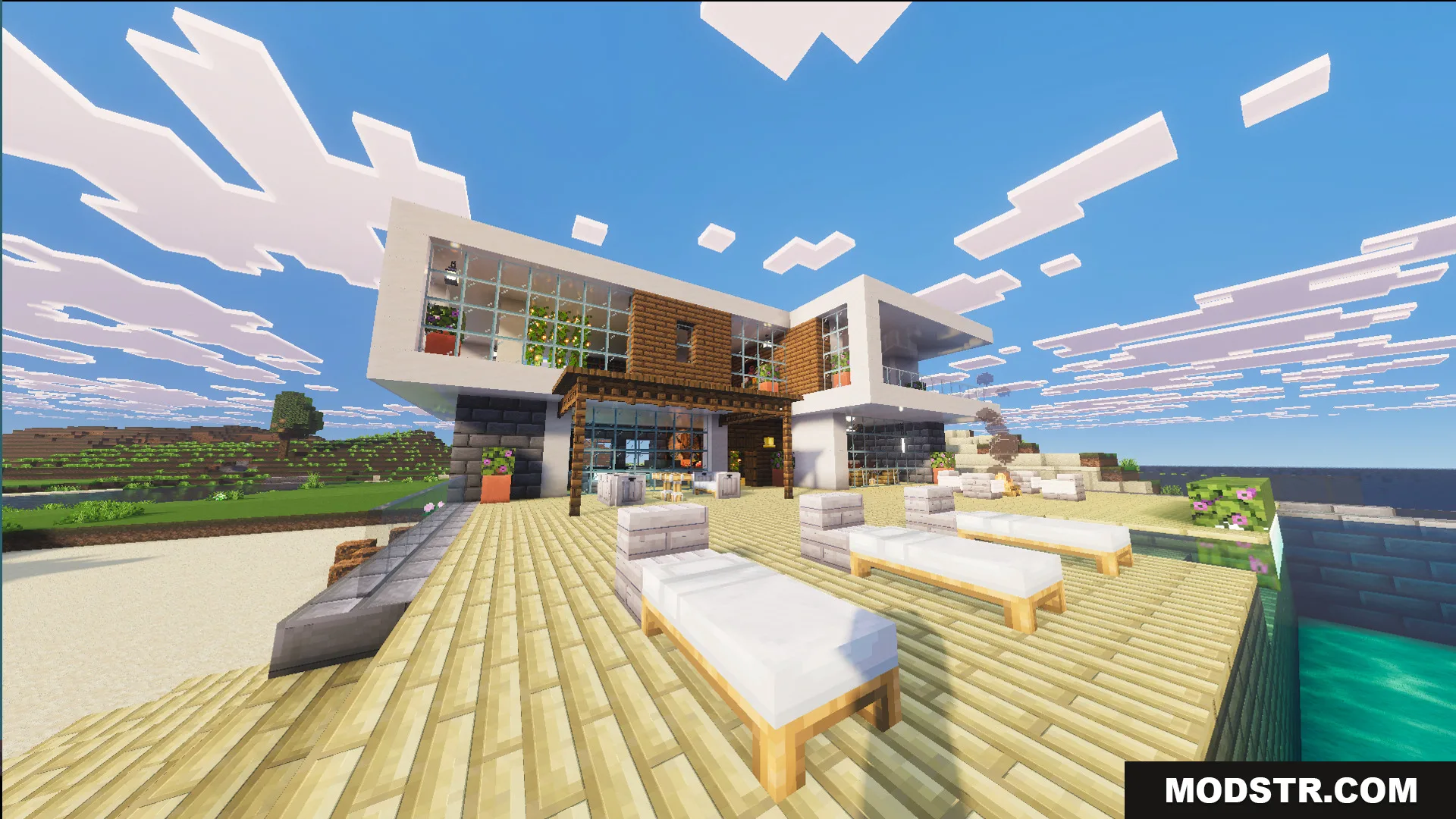 Survival Modern House 84 Map Screenshot 2 Outdoor patio with sun loungers and a swimming pool overlooking the ocean