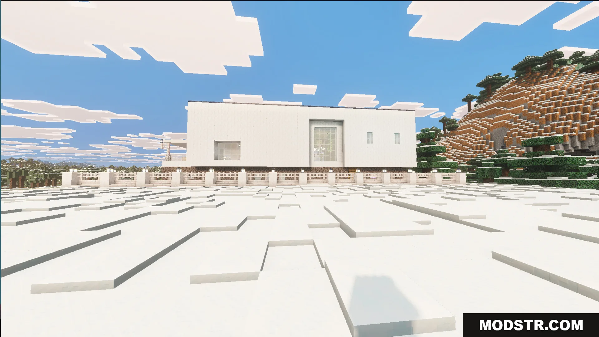 Exterior view of a white modern house located in a snowy biome