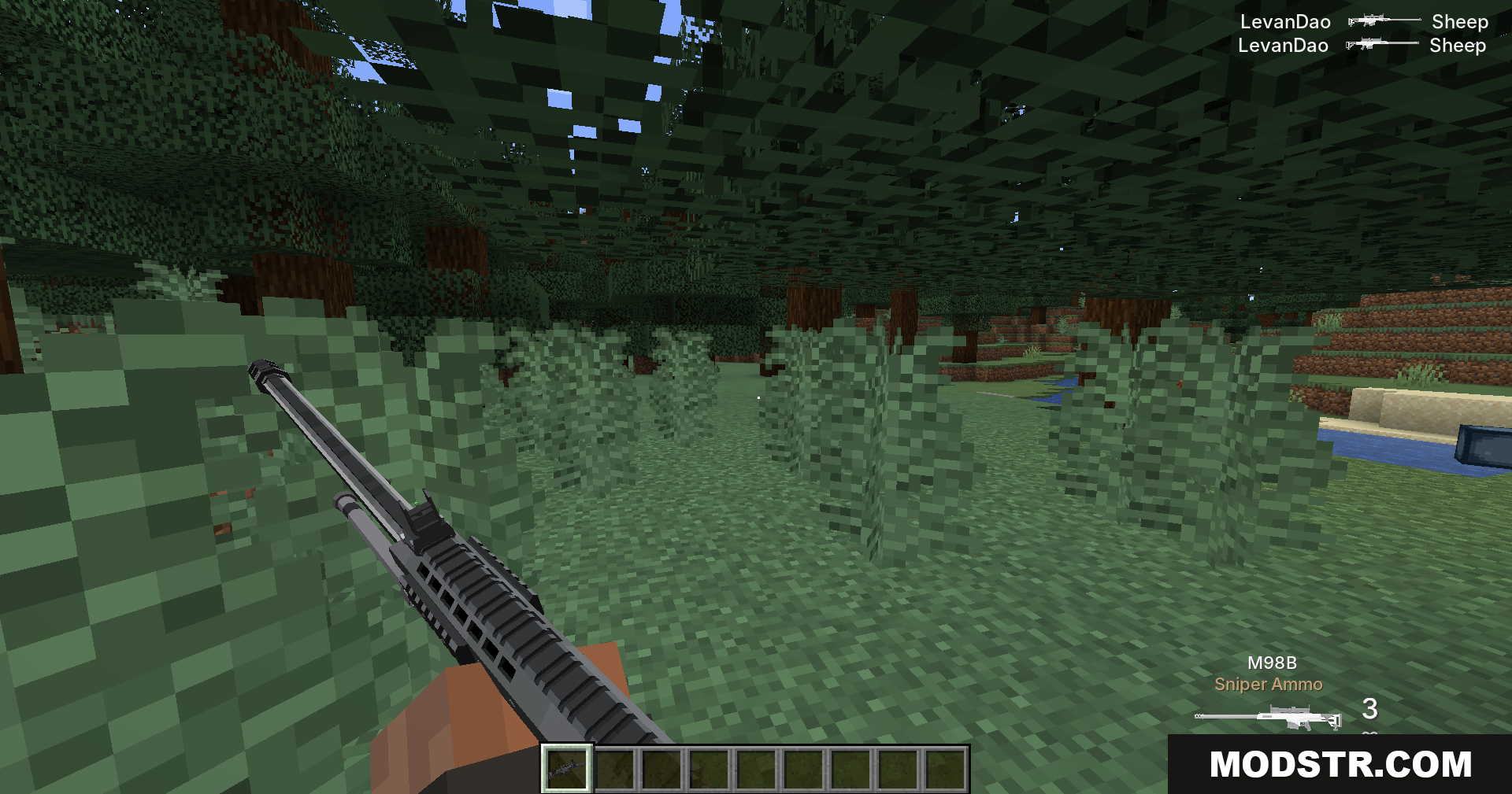 Tacz Sbw Playerrevive Gun Mod Screenshot 5 Player holding a TaCZ sniper rifle in a forest biome