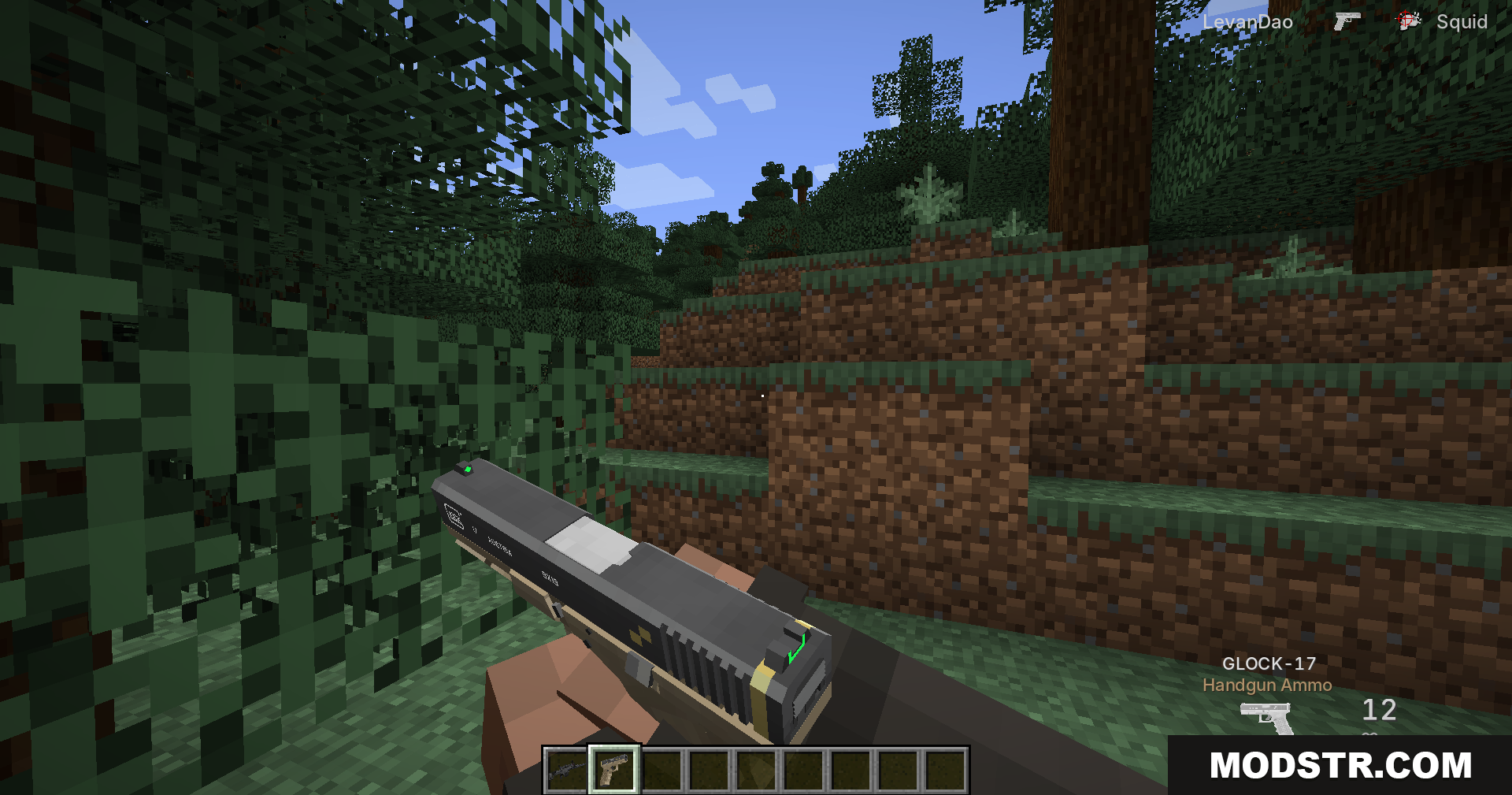 Tacz Sbw Playerrevive Gun Mod Screenshot 9 Player holding a Glock 17 handgun in a Minecraft forest biome