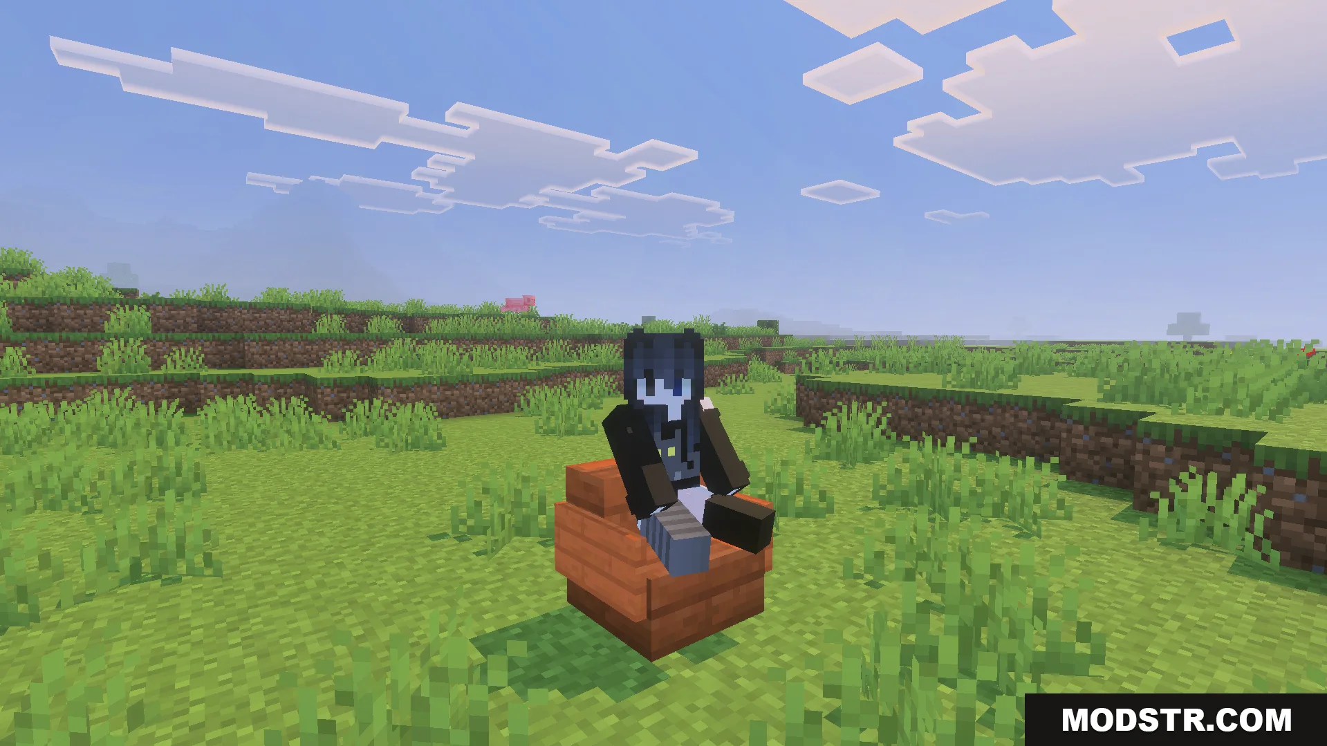 Take a Seat Addon Screenshot 2 Player character sitting on a wooden chair in a green grassy field