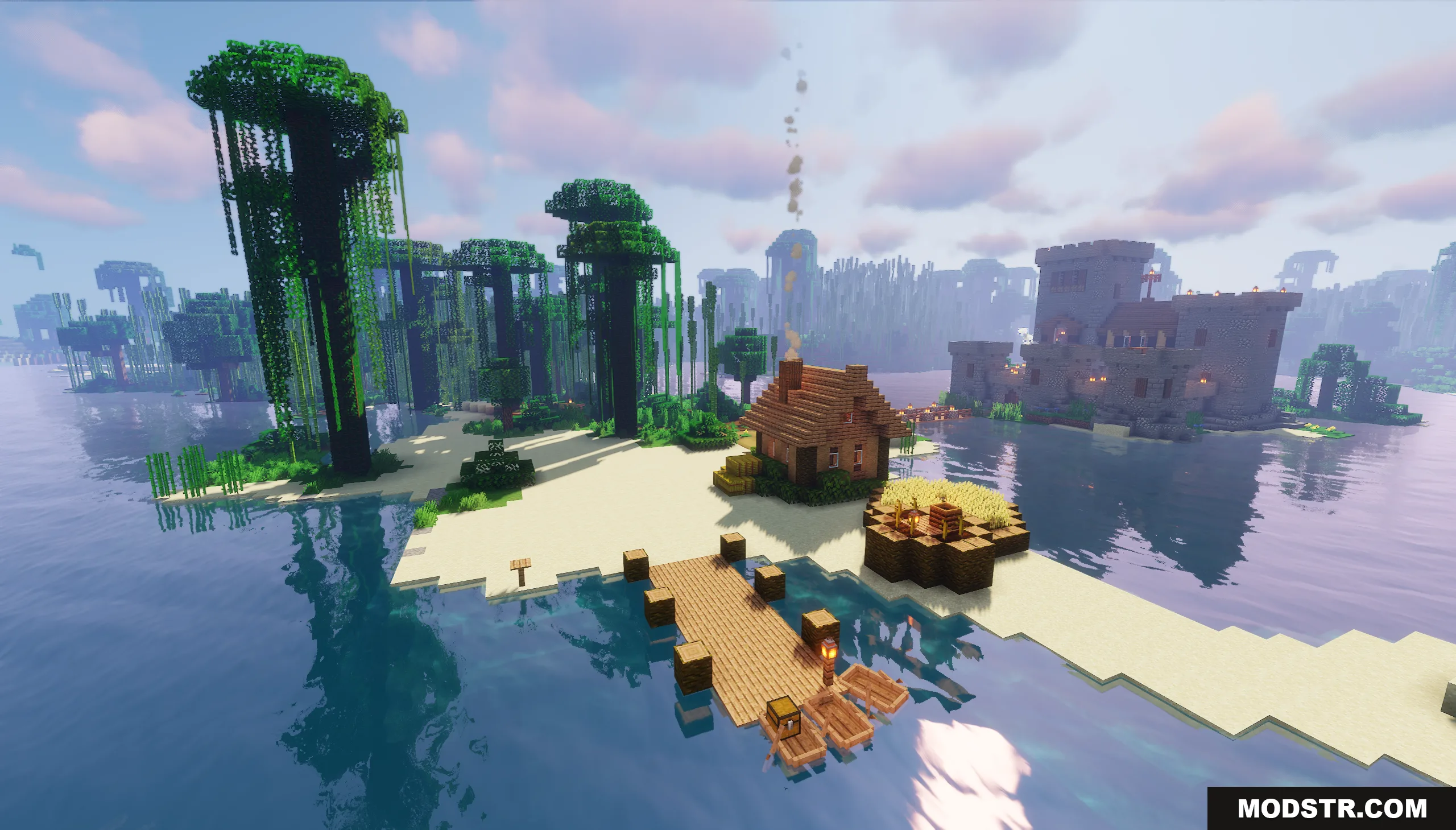 Large medieval stone castle across the water from a small island house