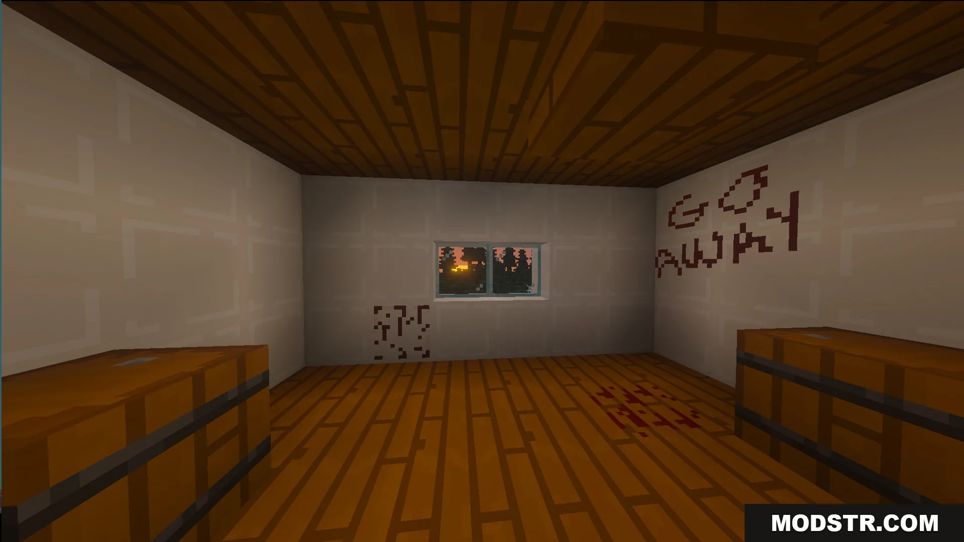 A scary room with blood stains and go away written on the wall
