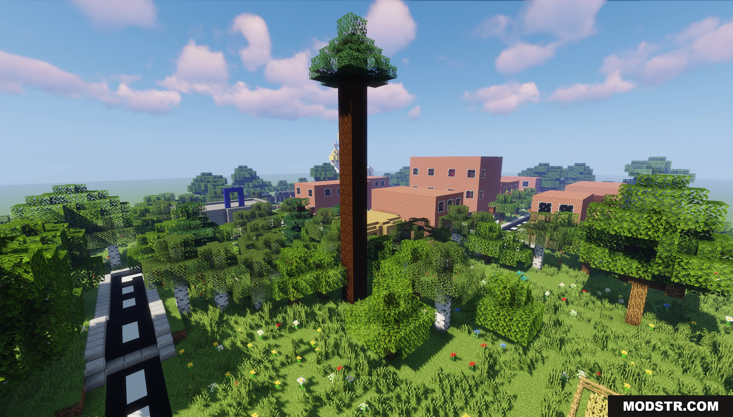 The Town of Mordovia Map Screenshot 2 A tall tree stands near brick buildings and a road in the forest