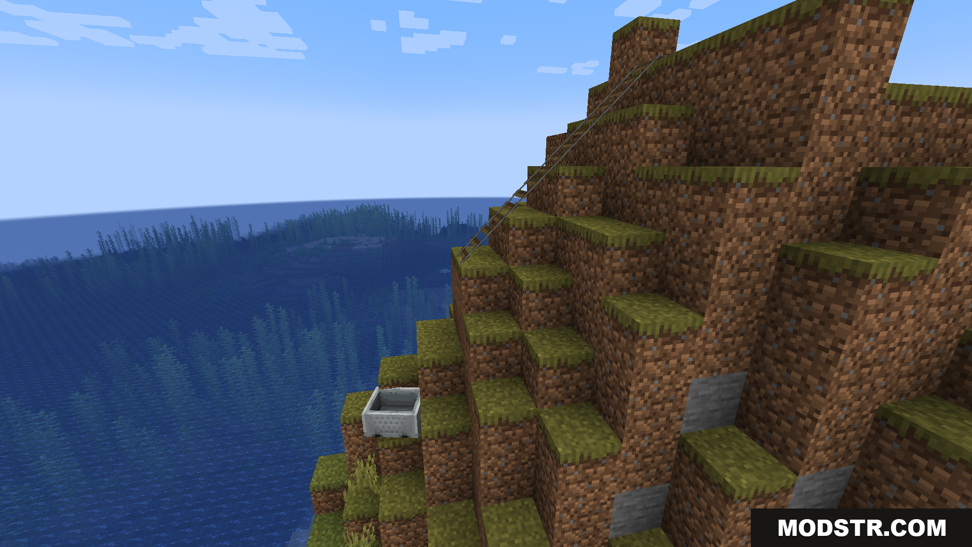 Train Network Optimisations Mod Screenshot 6 An empty minecart at the bottom of a cliffside railway