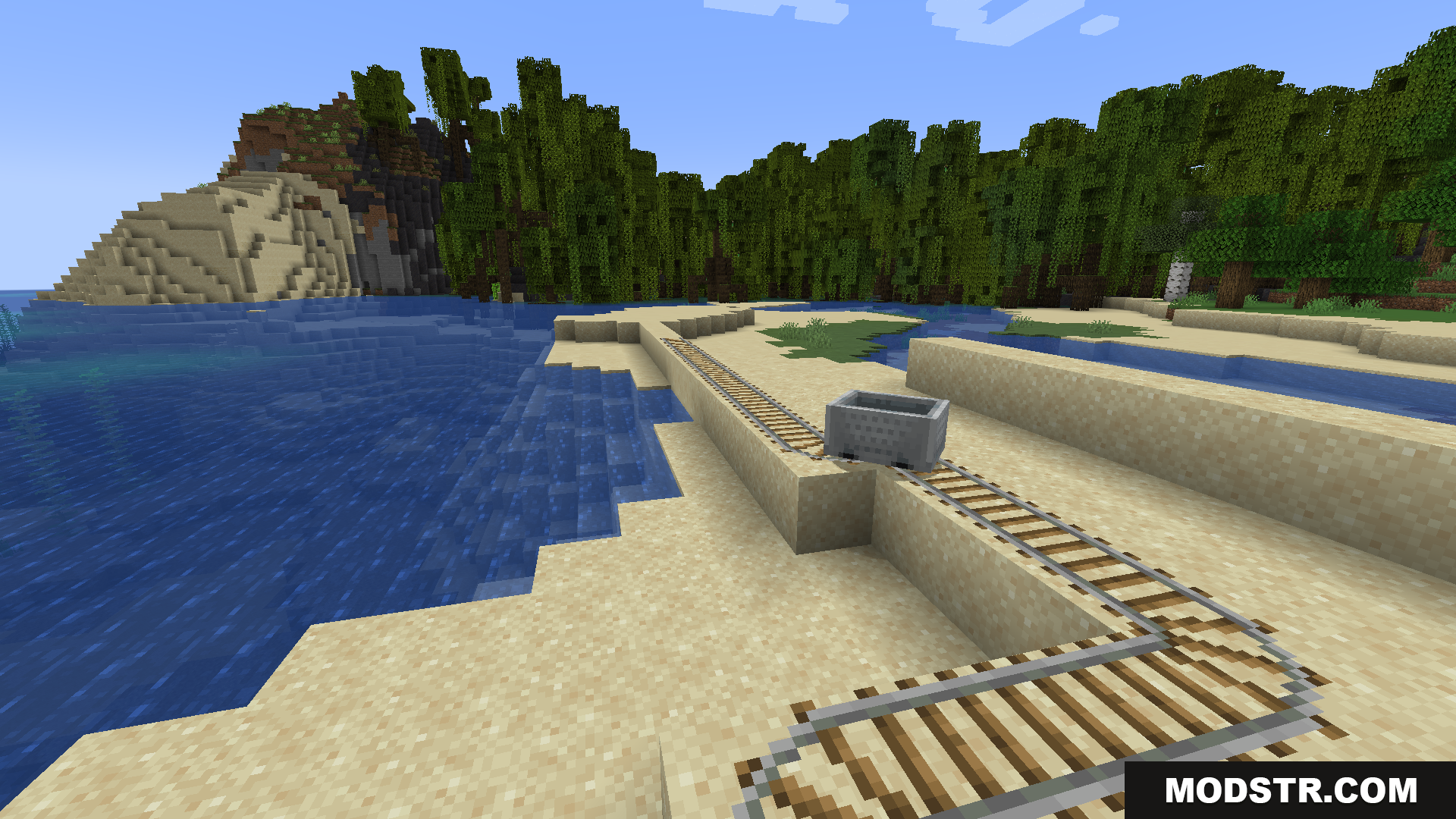 Train Network Optimisations Mod Screenshot 8 A single minecart sits on a track by the water