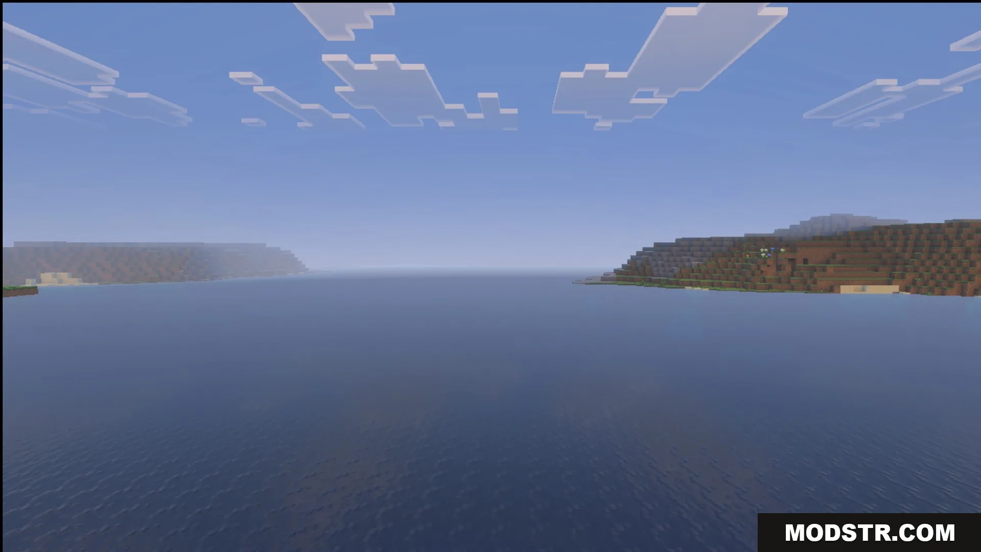 Daytime ocean water, clouds and shoreline with the Ultimate Survival pack
