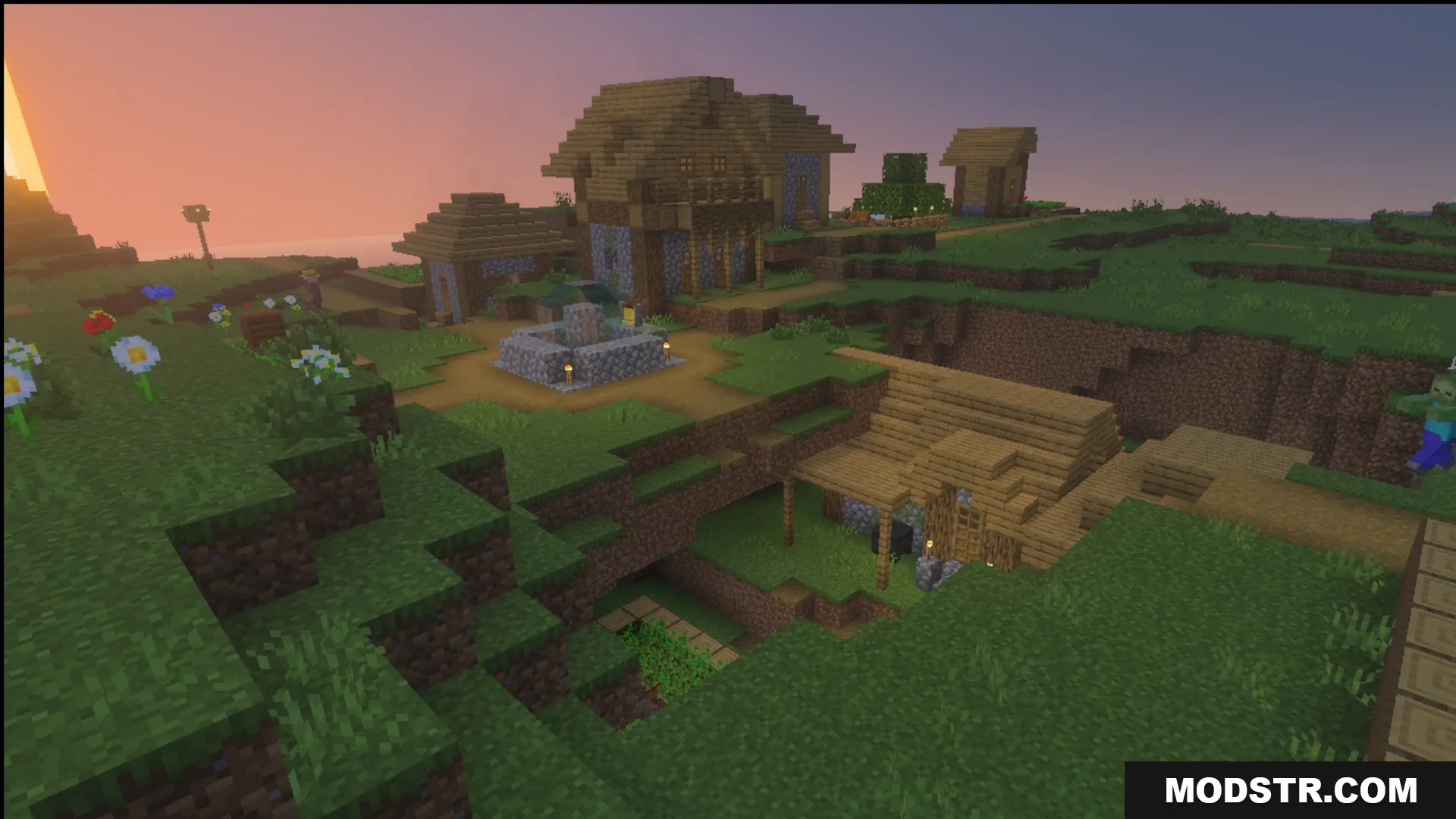 Wooden houses and a village fountain at sunset with the Ultimate Survival pack