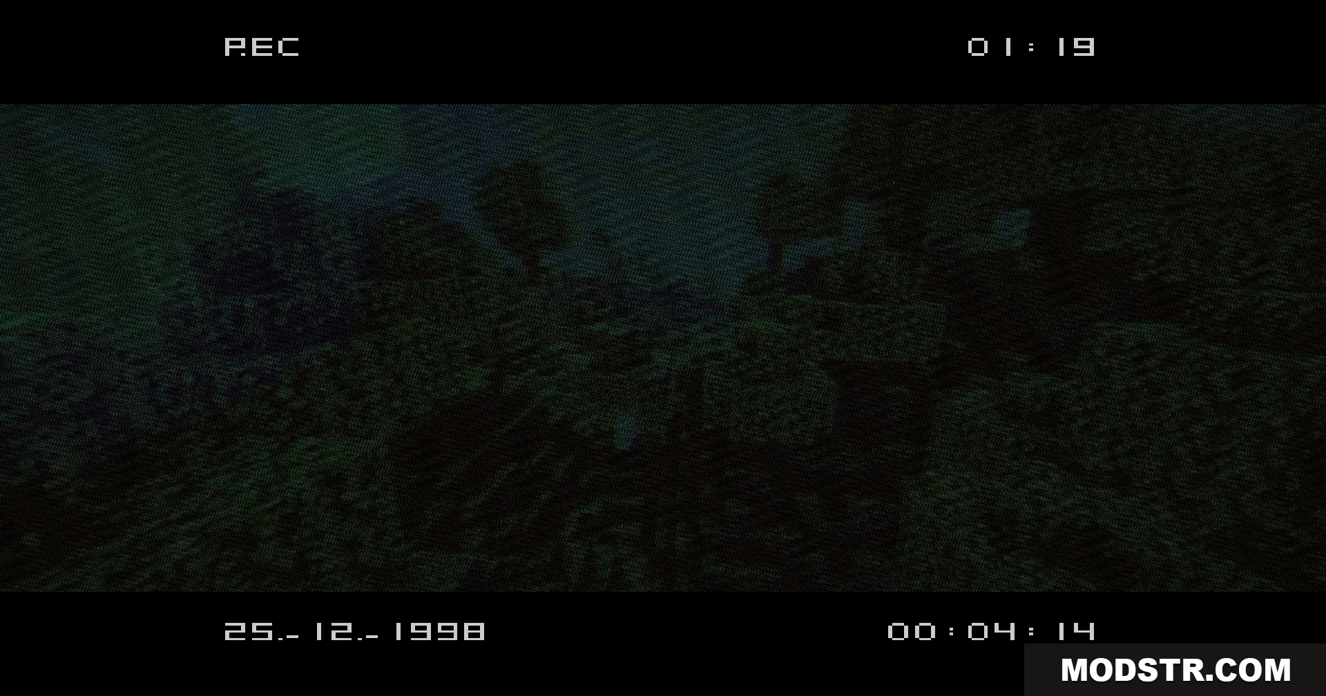 VHS X BSL Shaders Screenshot 9 A dark Minecraft landscape captured with a retro VHS camcorder recording interface