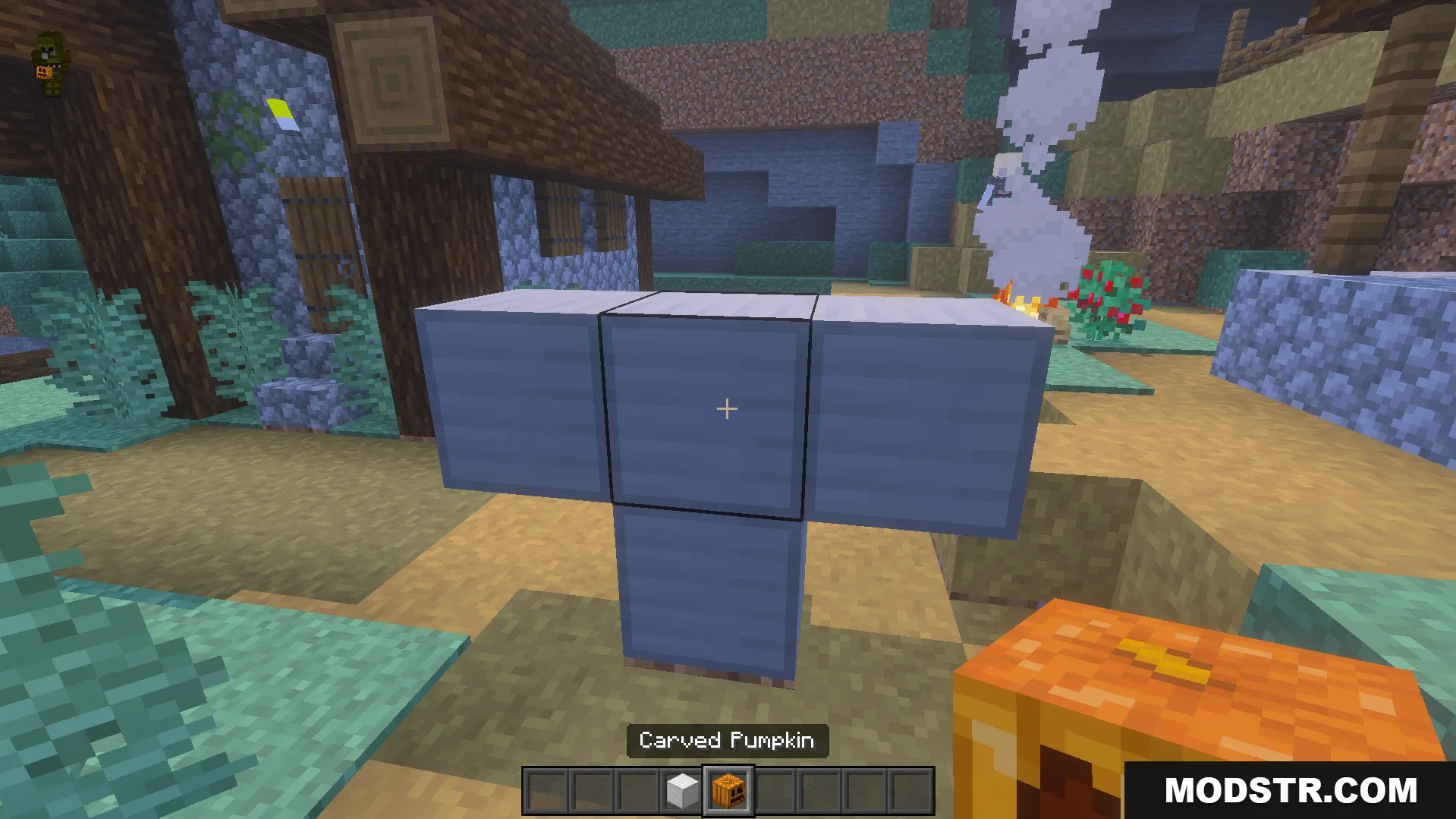Village Girls TP Texture Pack Screenshot 7 Player holds a carved pumpkin while looking at a blue block structure