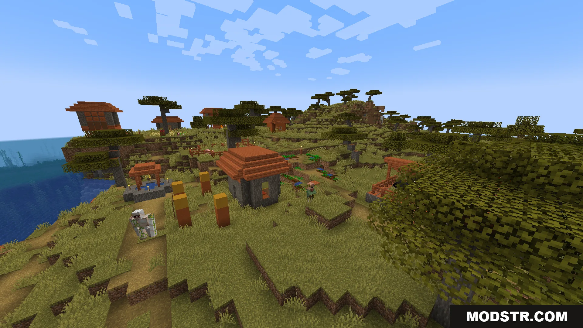 A peaceful savanna village featuring acacia wood houses and an iron golem