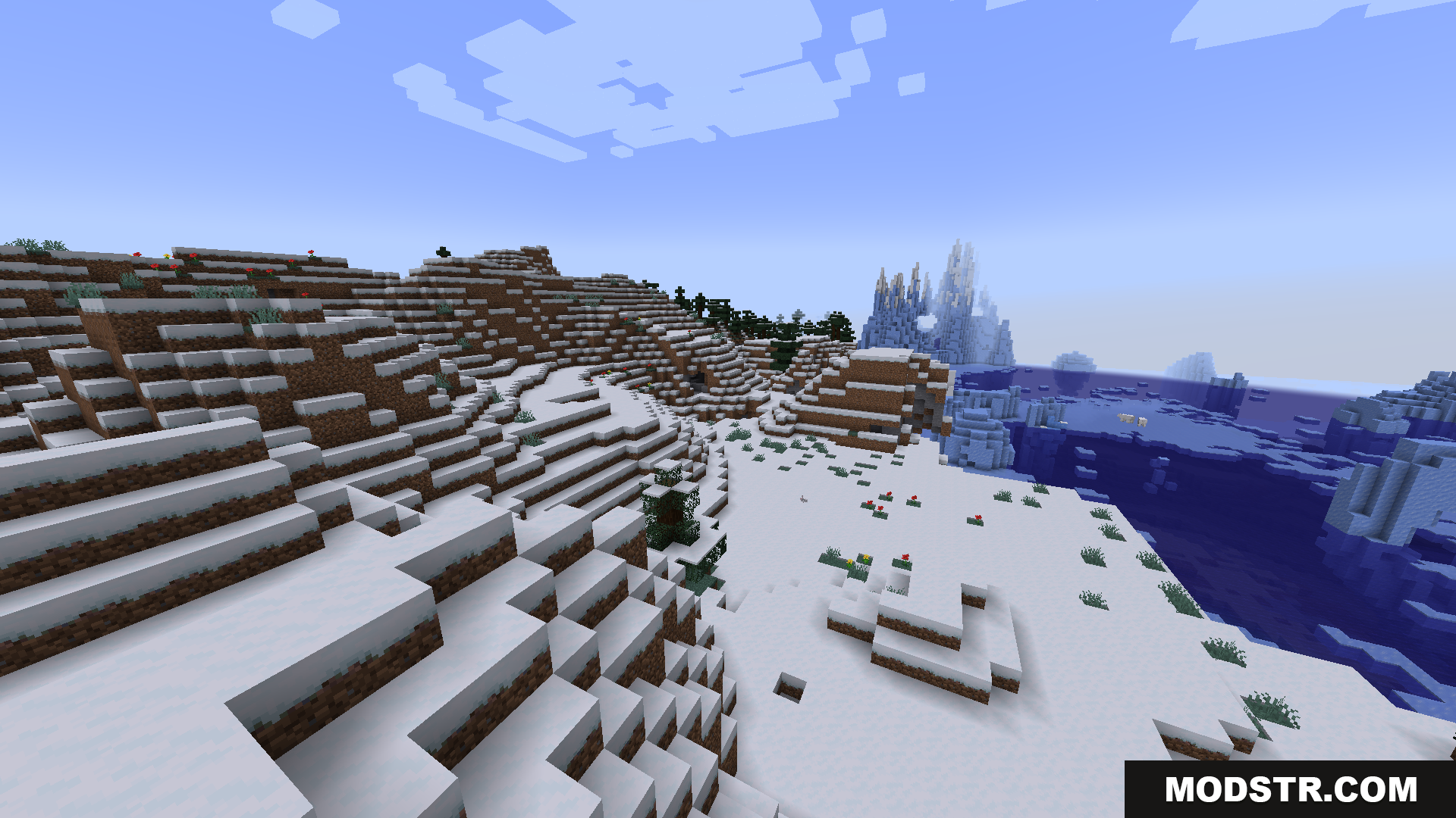 A snowy landscape with hills and frozen terrain
